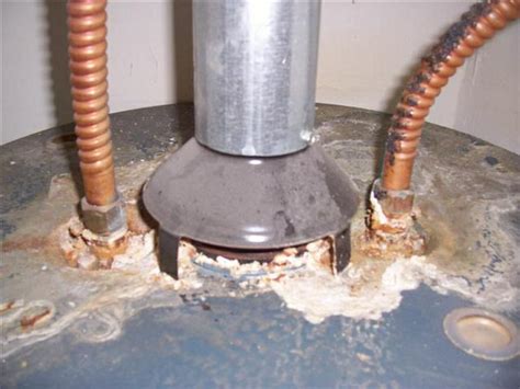 water heater leaking from top seam|Why Is My Water Heater Leaking From The Top Vent And How。